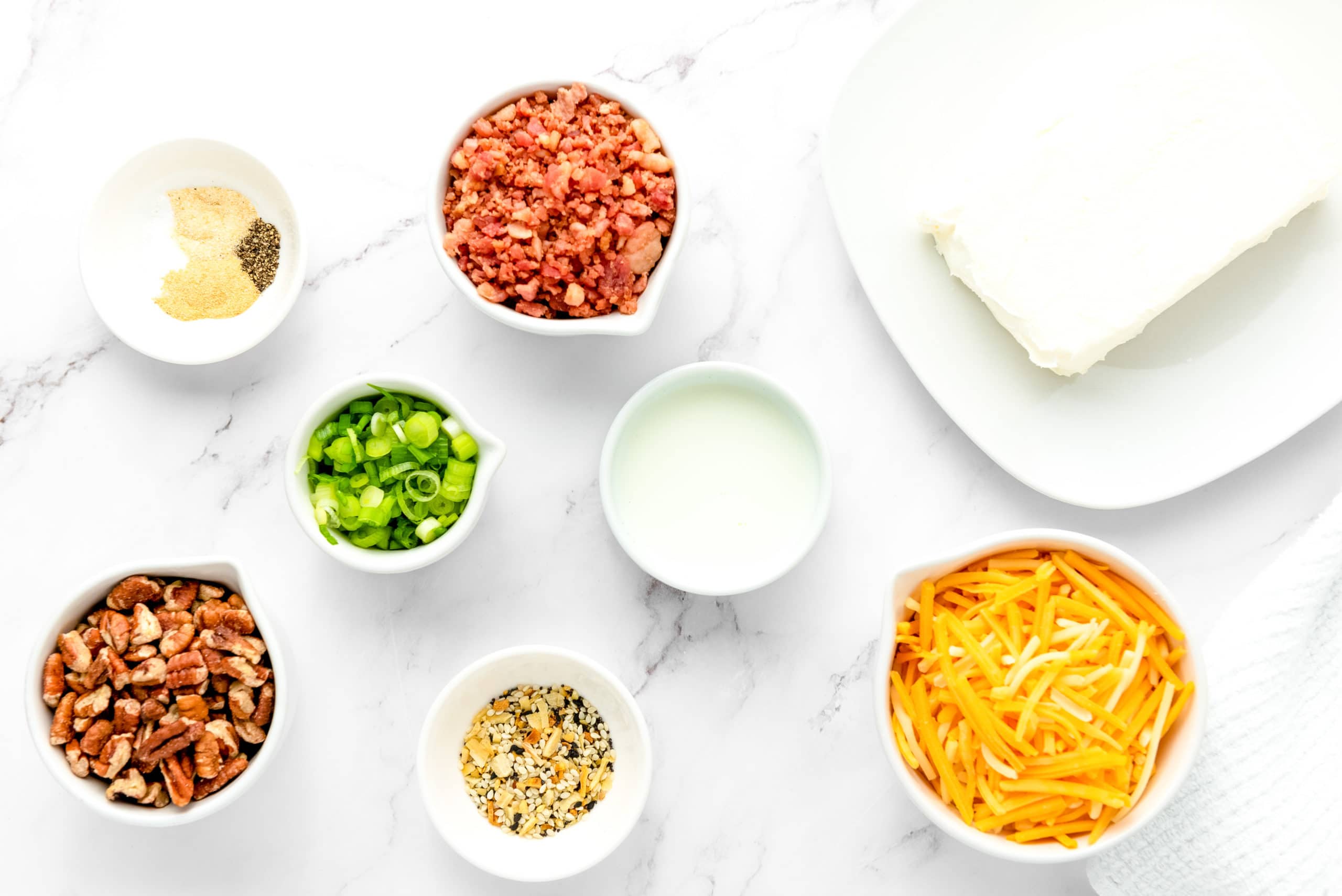 all of the ingredients that make up a beacon pecan cheese ball