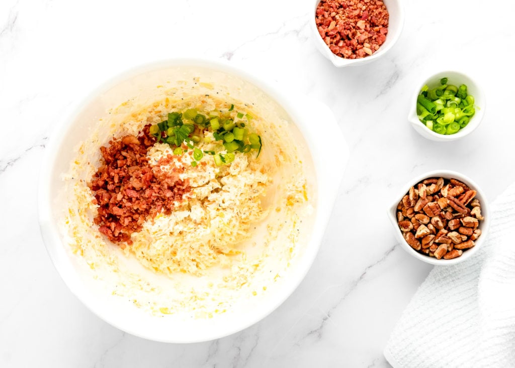 mixing up cheese ball ingredients
