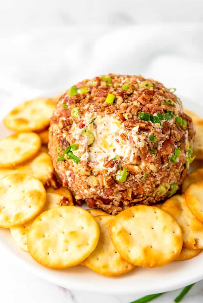 pecan bacon cheese ball served with butter round crackers