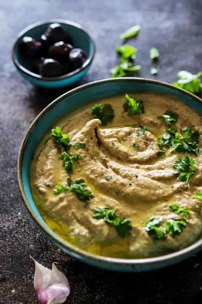 Baba Ganoush Eggplant Dip in a bowl with garnish