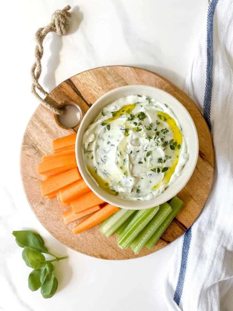 whipped ricotta dip with honey drizzle with carrots and celery dippers on the side