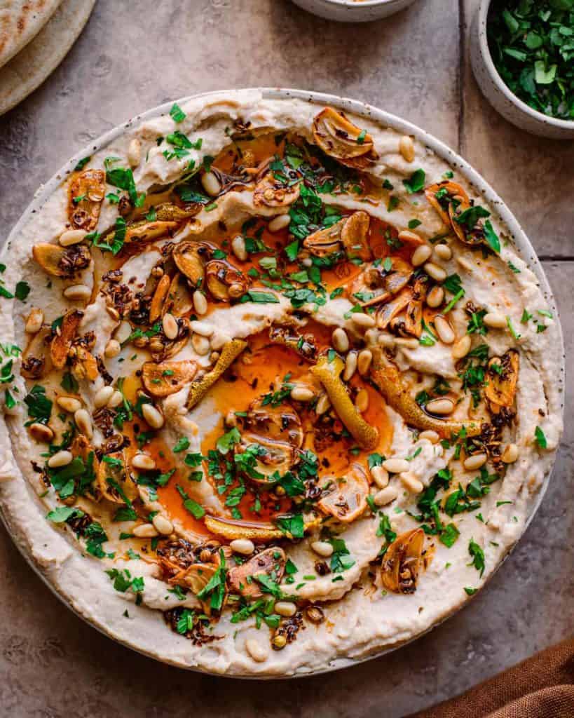 Lemony White Bean Dip in a bowl with garnish