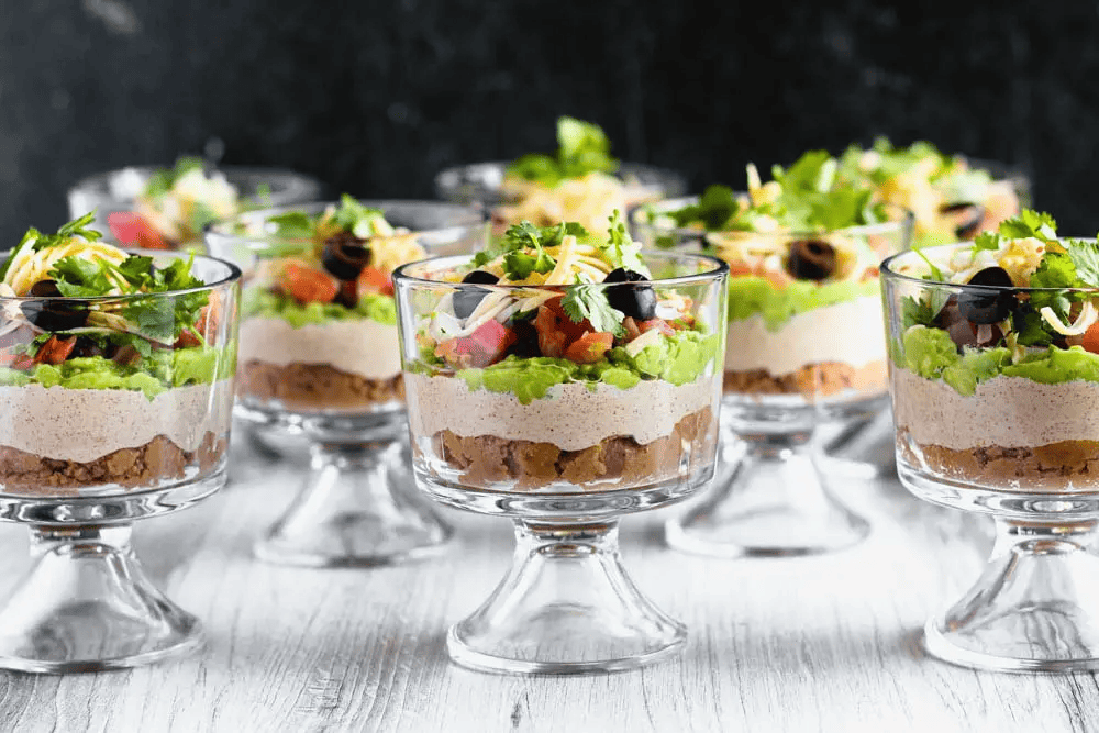 individual portions of seven layer dip