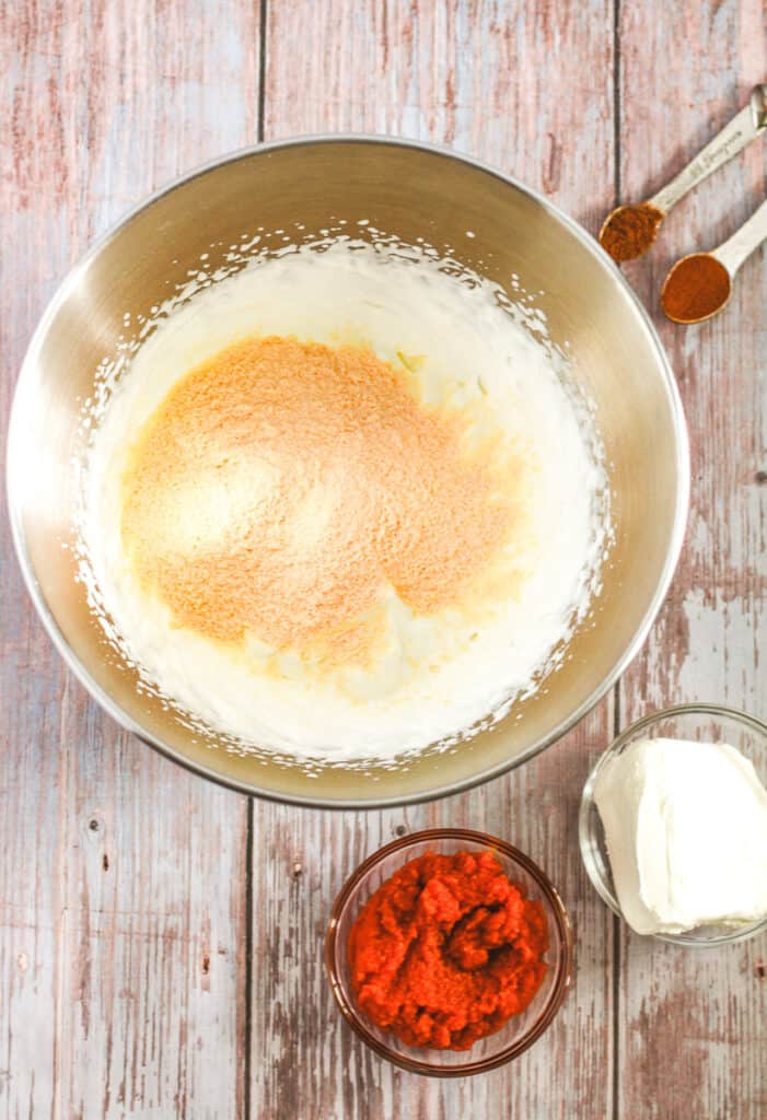 whipped cream with vanilla pudding mix in a bowl