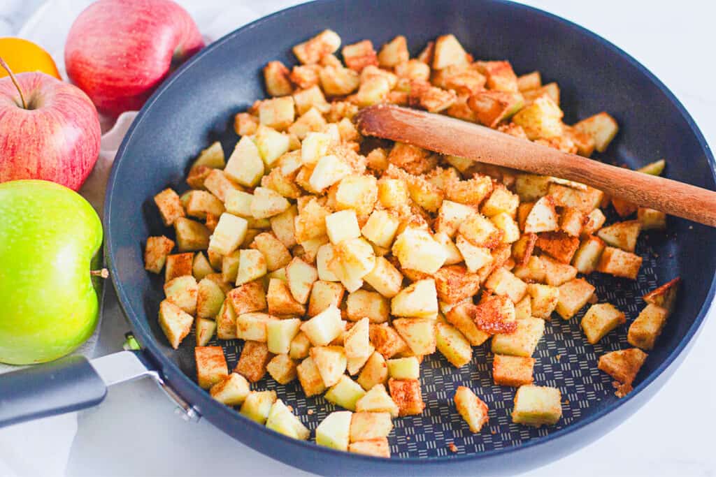 apples and sugar in a saucepan