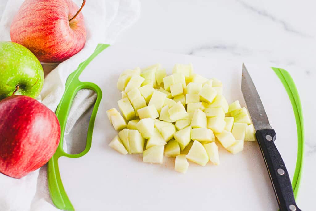 chopped apples on a cutting board