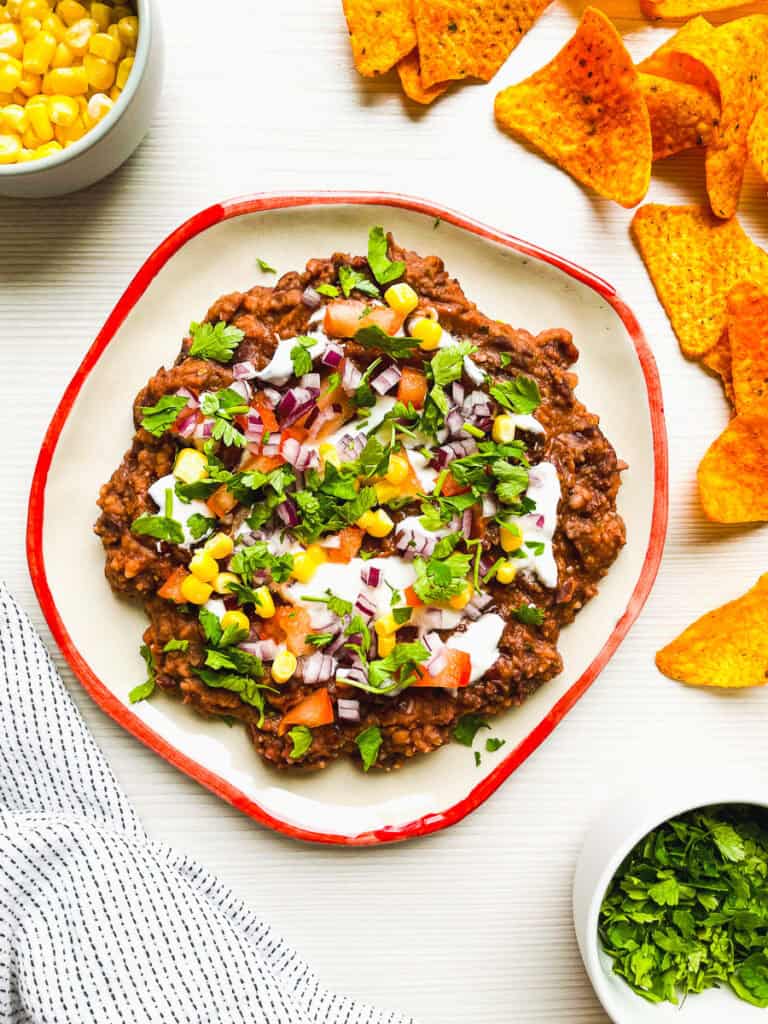 prepared black bean dip recipe with tex-mex flavors perfect for taco tuesday and game day