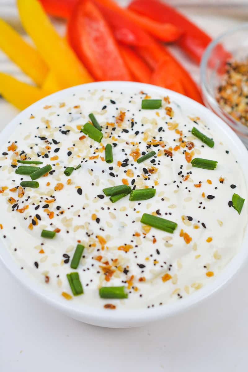 prepared everything bagel dip with sliced peppers for dipping