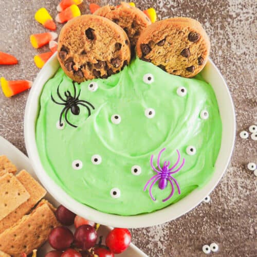 easy halloween dessert dip with green food coloring and candy googly eyes