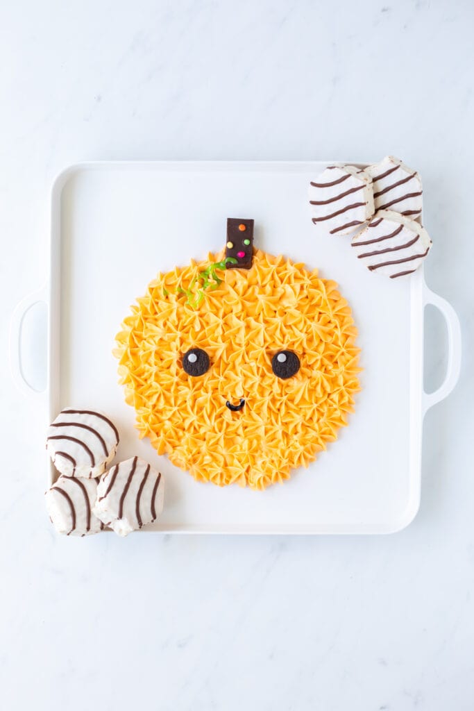 pumpkin frosting board with green icing stem