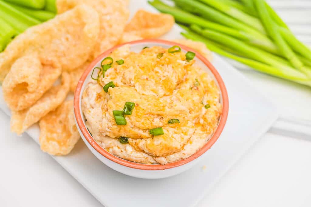 warm crab rangoon dip with dippers on the side