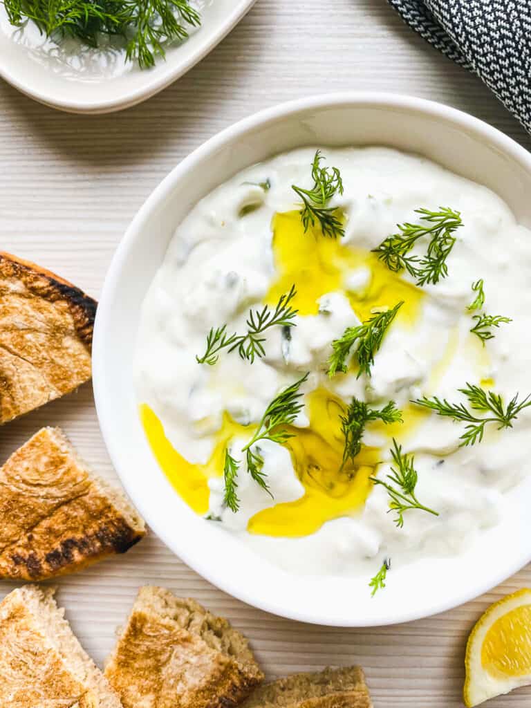 tzatziki with fresh dill and olive oil drizzle