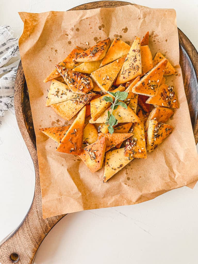 seasoned Zaatar Pita Chips on brown paper 