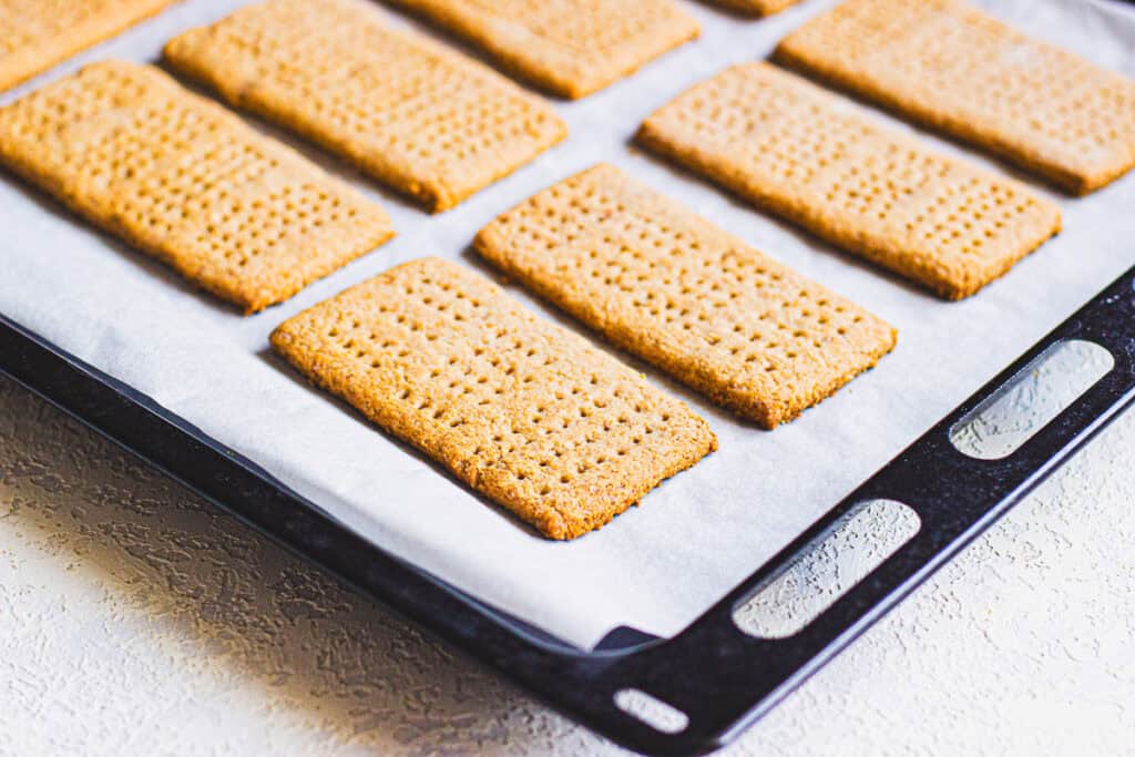 homemade graham crackers on a baking sheet