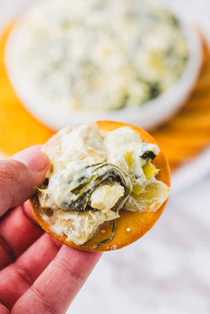 butter cracker with spinach artichoke dip