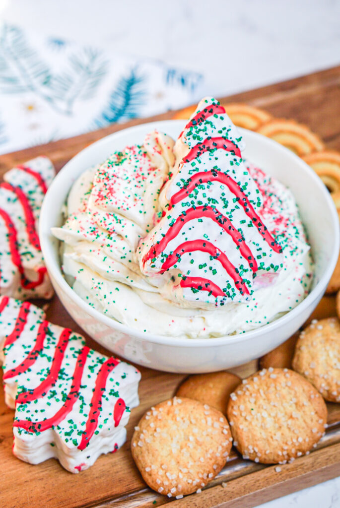 prepared holiday dessert dip with Little Debbie Christmas tree cake garnish and sprinkes