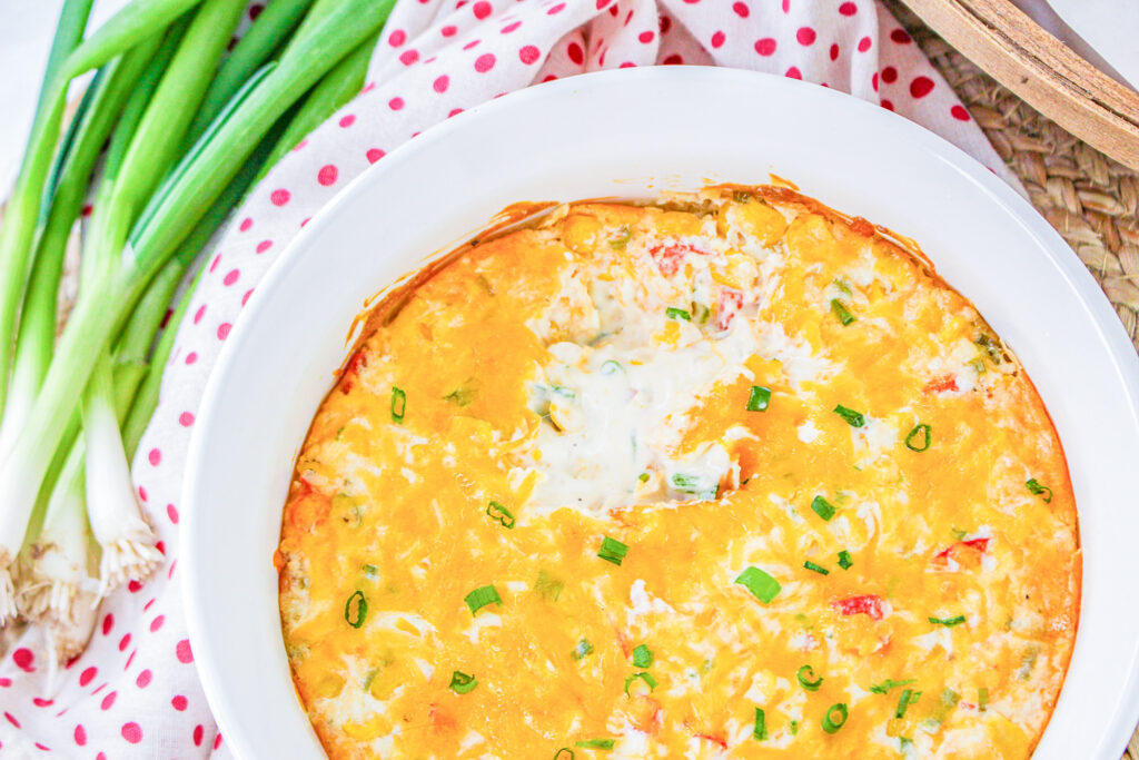 hot corn dip with cream cheese ready to serve at party