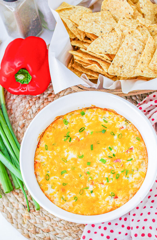 hot corn dip with a side of tortilla chips