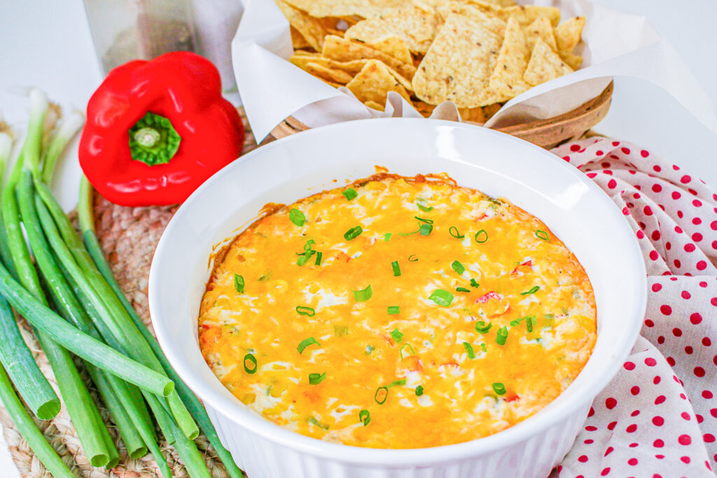 ready to serve hot corn dip in a baking dish