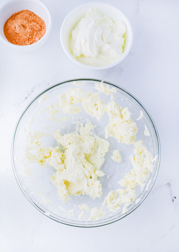 beaten cream cheese in a bowl