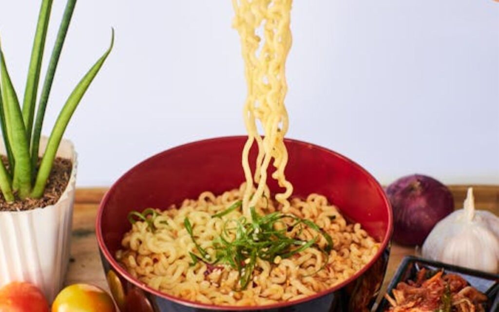 Bowl of ramen noodles with green onions