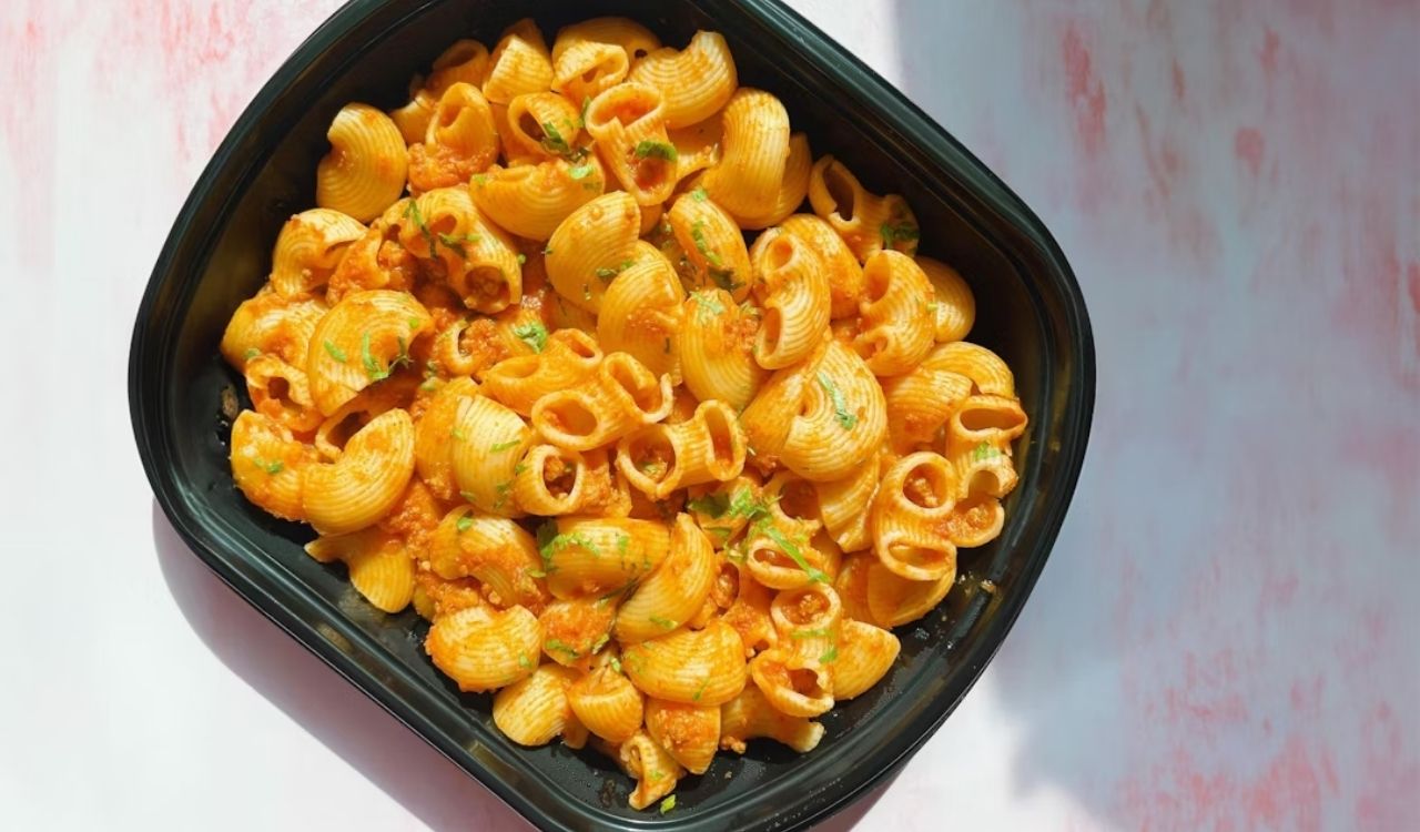 A bowl filled with macaroni and cheese