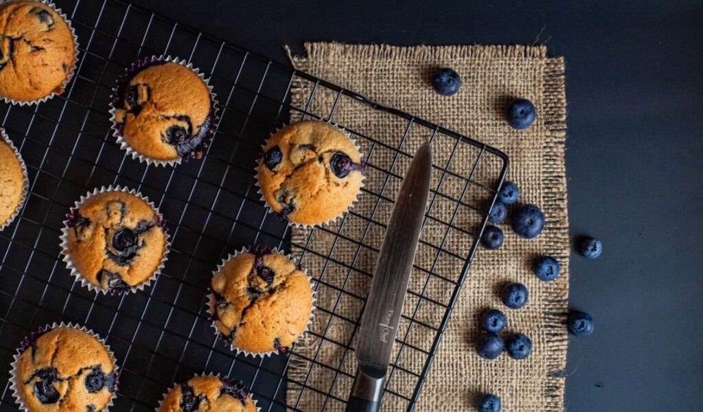Blueberry muffins in cooling rack