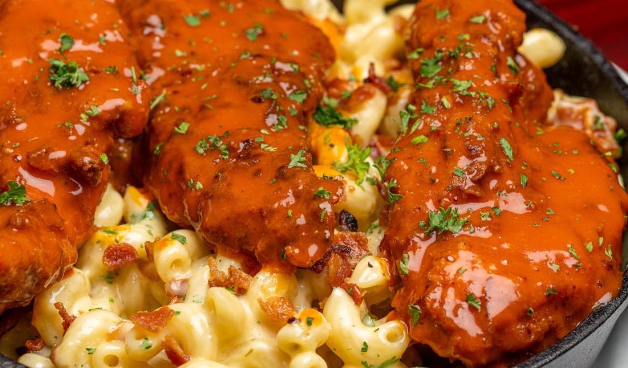 Buffalo chicken on top of mac and cheese