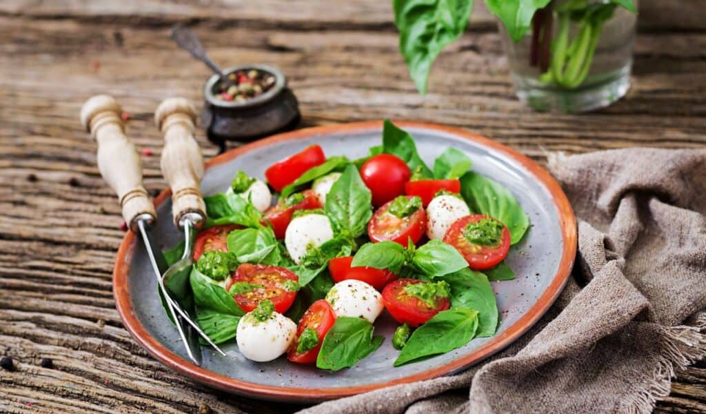 Caprese salad. healthy meal with cherry tomatoes, mozzarella balls