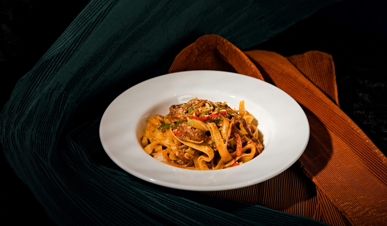 Delicious Homemade Tagliatelle in White Plate