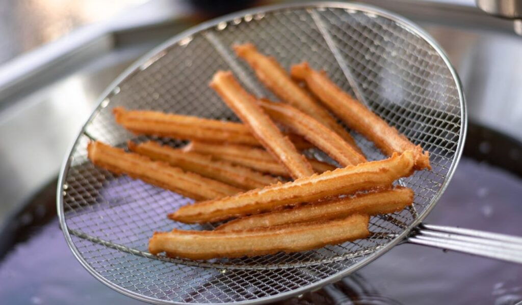 Churros on Stainless Steel Strainer
