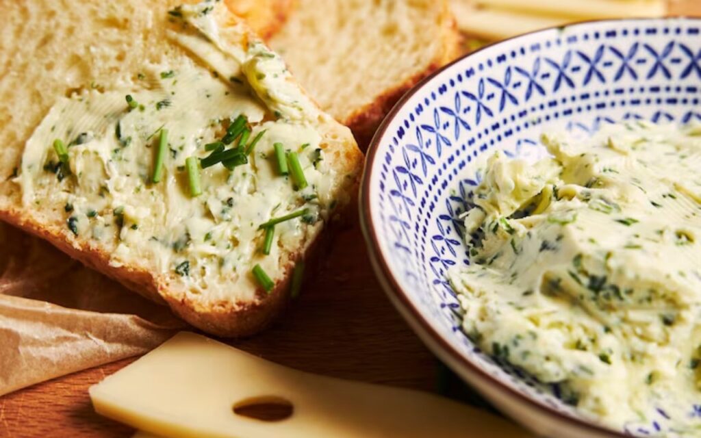 Spinach artichoke dip spread on bread