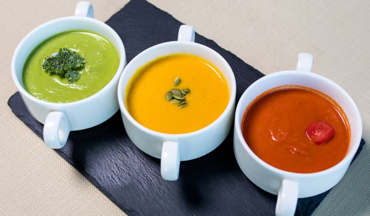 Close up of a variety of soups
