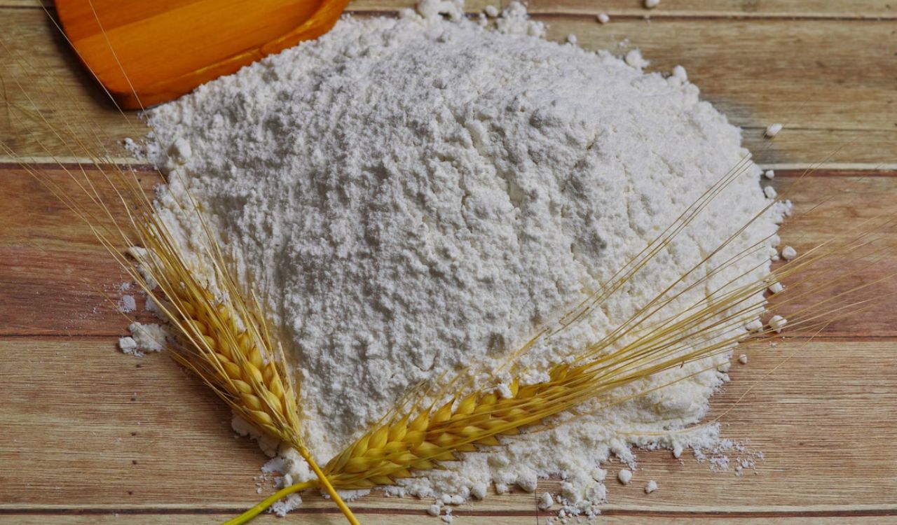 Flour on brown wooden table
