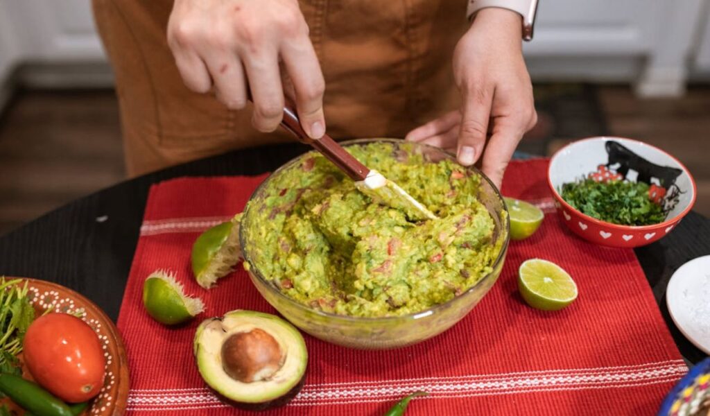 Green Guacamole in Clear Glass Bowl