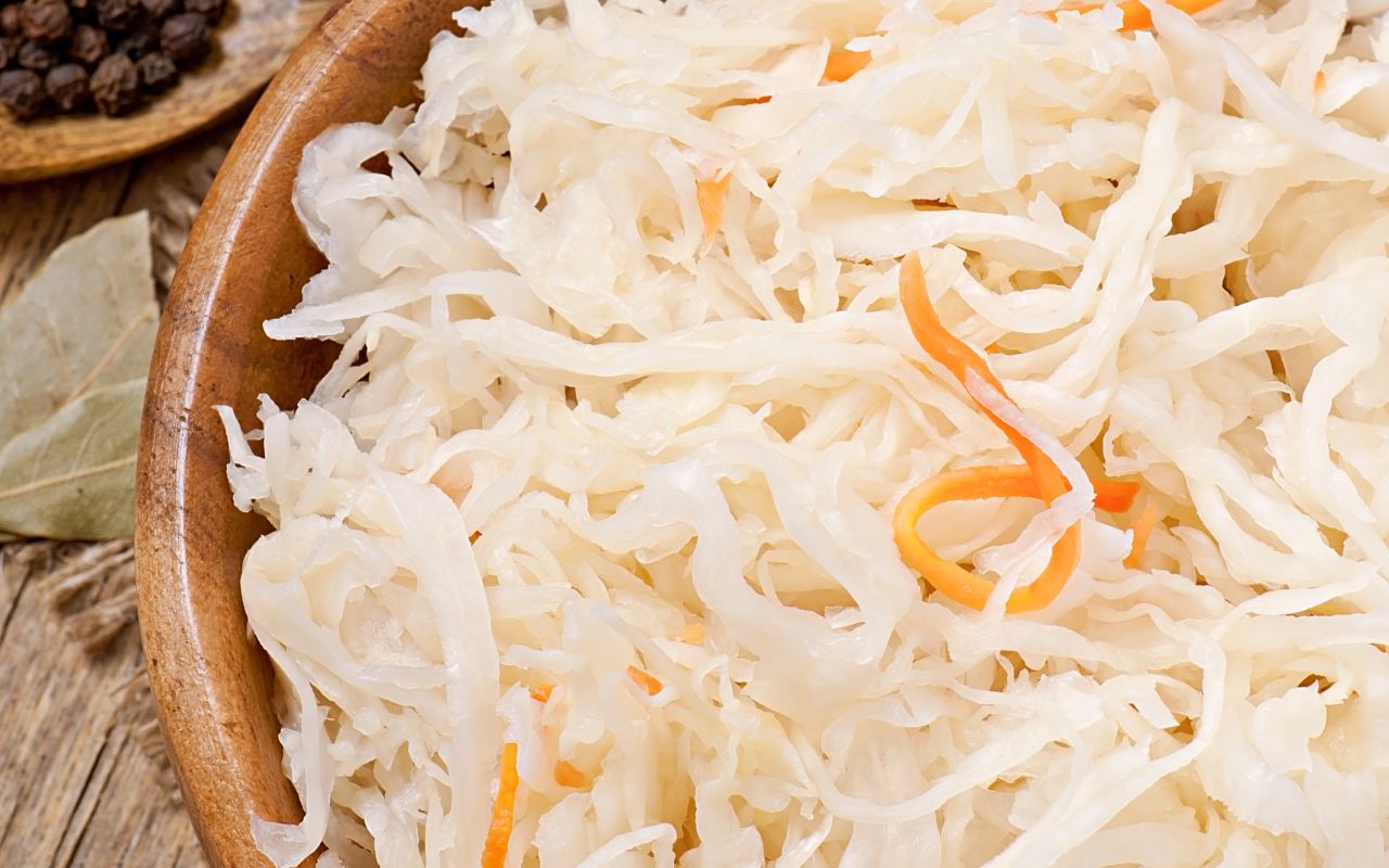Close-up of sauerkraut with shredded carrots