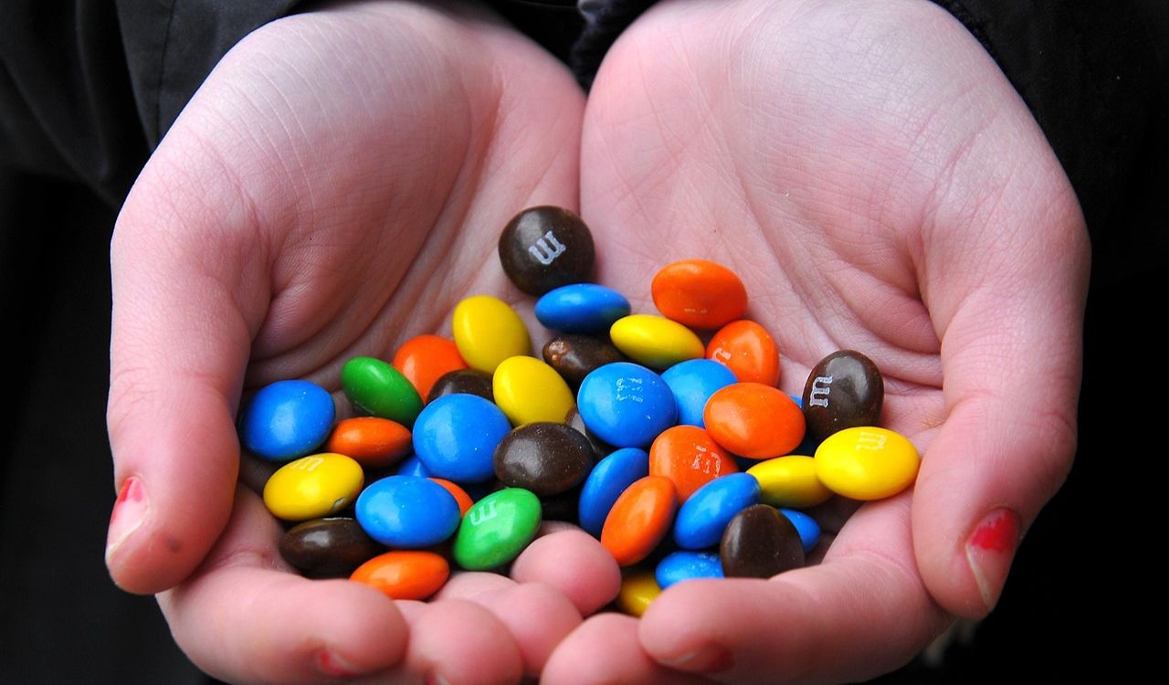 M and M's in hand