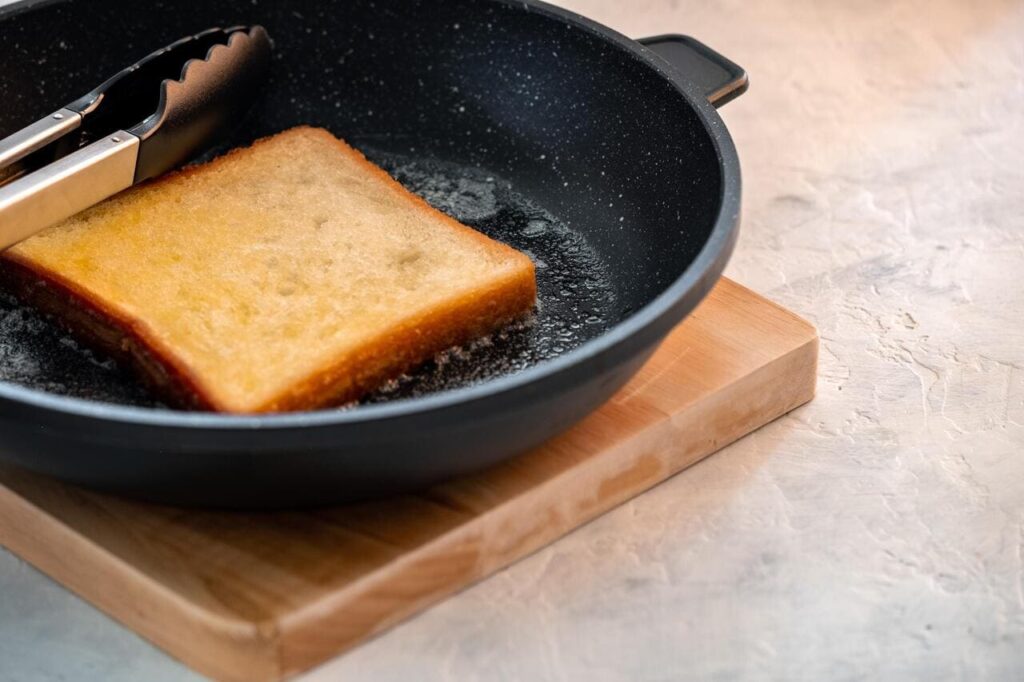 Crispy white bread toasters with butter 