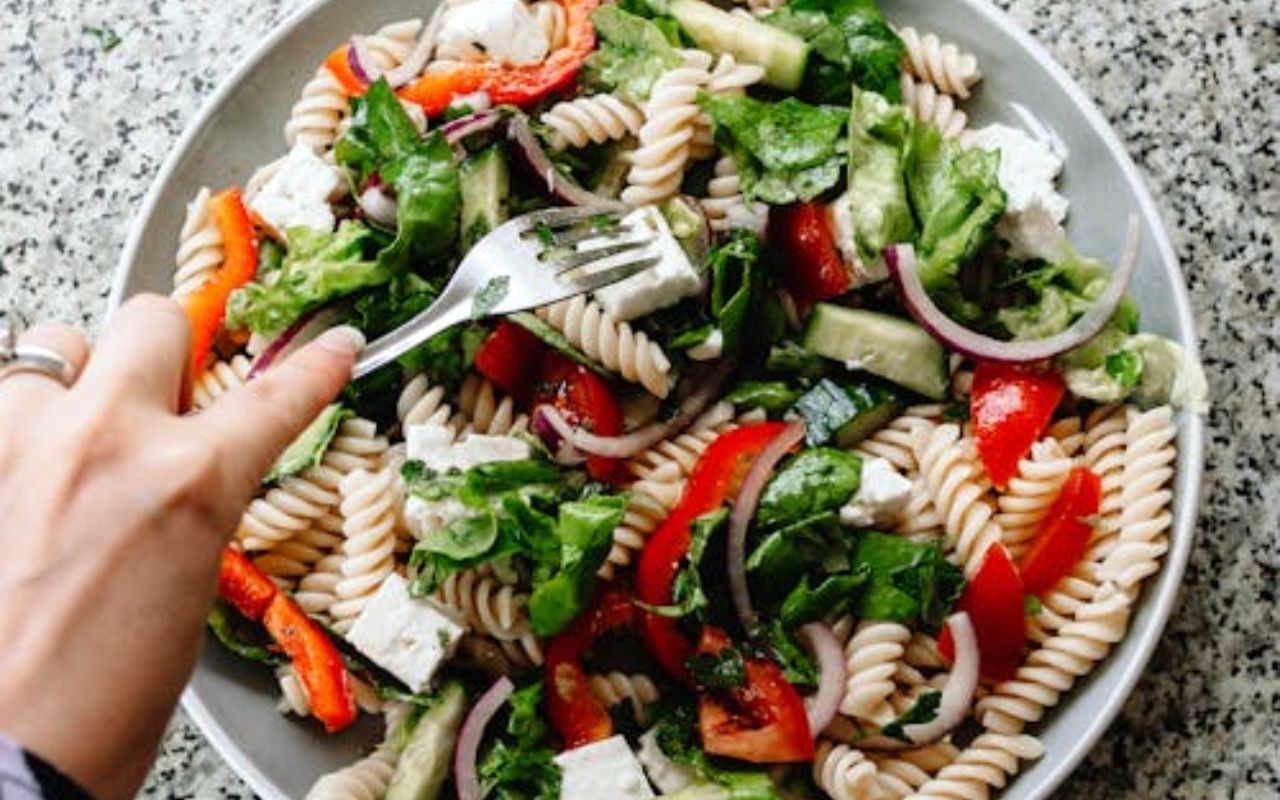 Mediterranean pasta salad with rotini, feta, and veggies