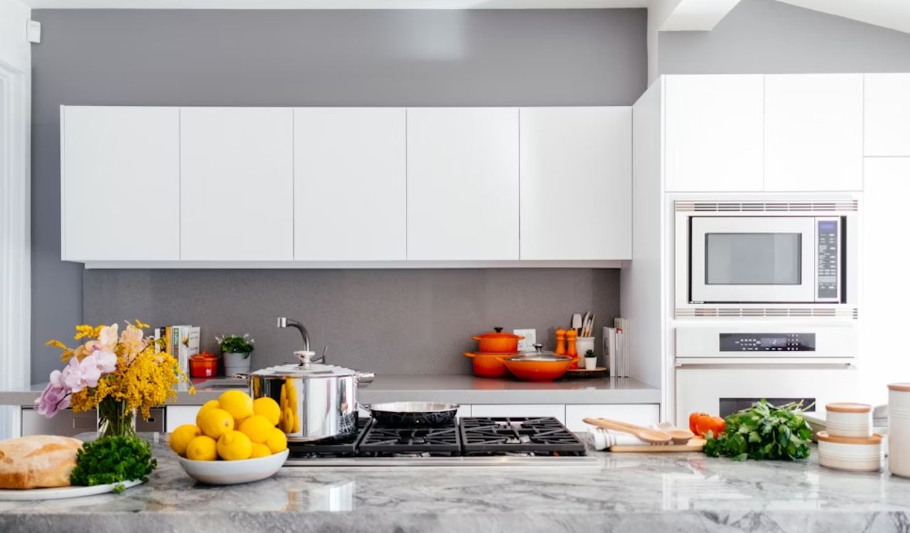 Microwave oven in white kitchen