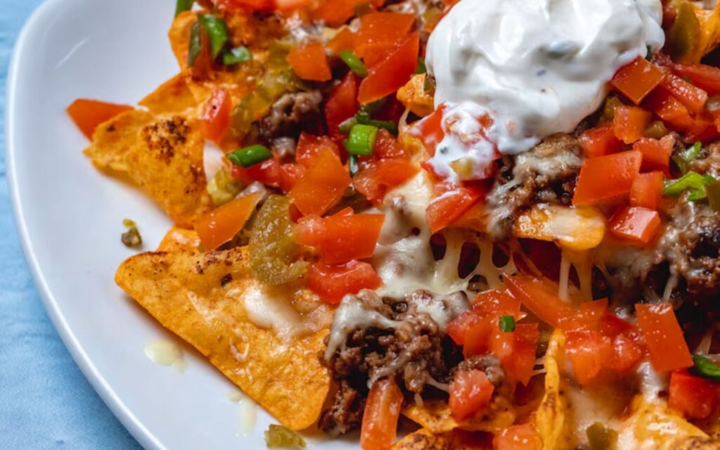 Loaded beef nachos with sour cream
