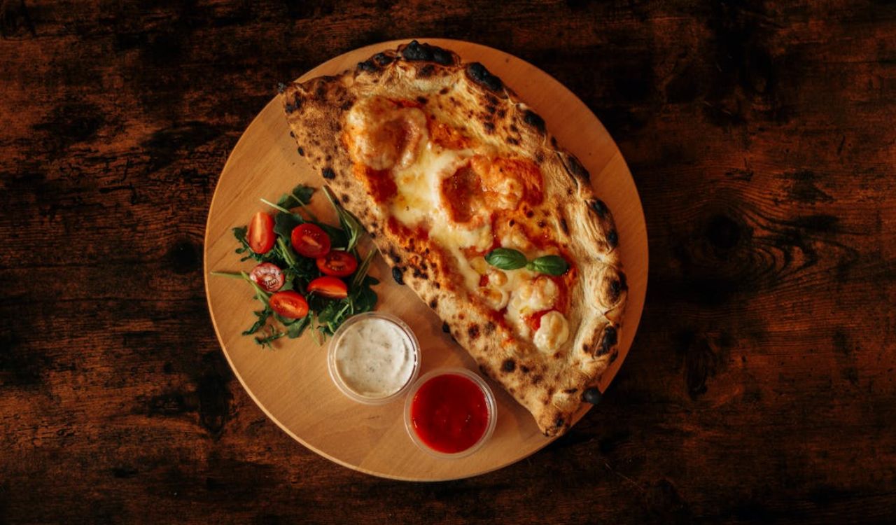 Pizza with ranch and hot sauce