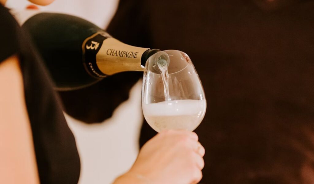 Pouring Champagne into a glass