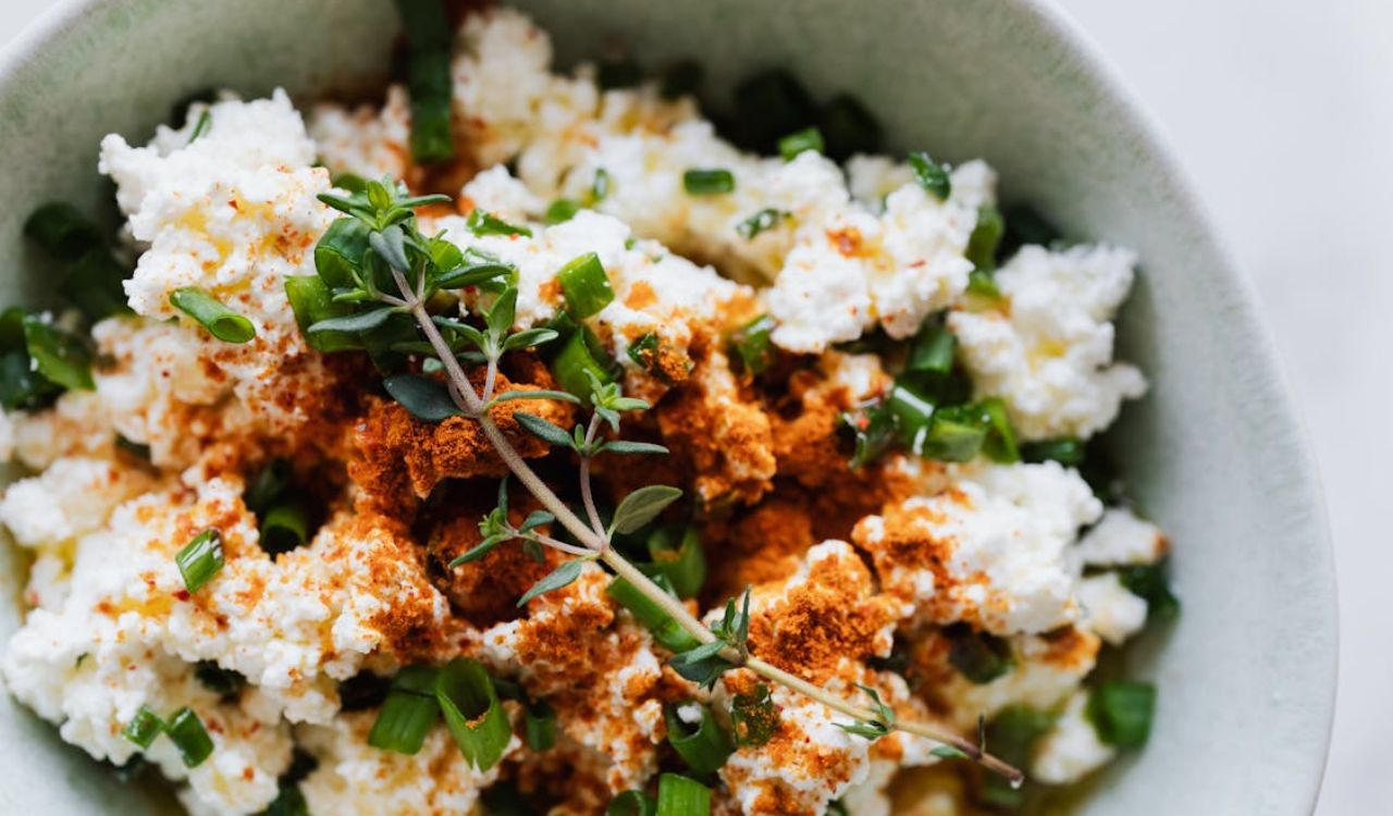 Salad with cottage cheese green onion and brunch of thyme