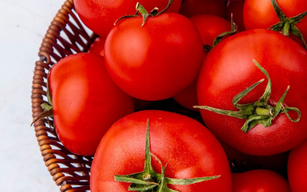 Basket of ripe red tomatoes