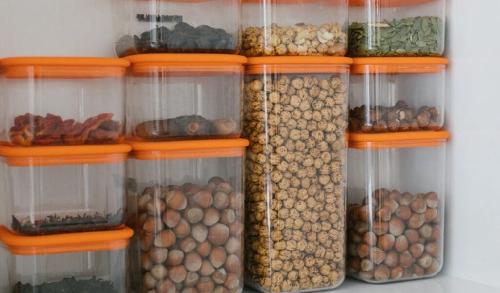 Various Nuts and Grains in Plastic Containers