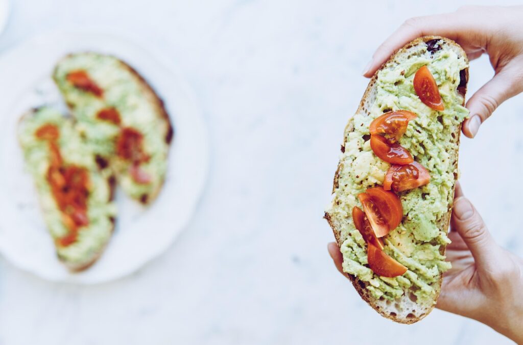 Avocado toast, Flatlay, Hand image.