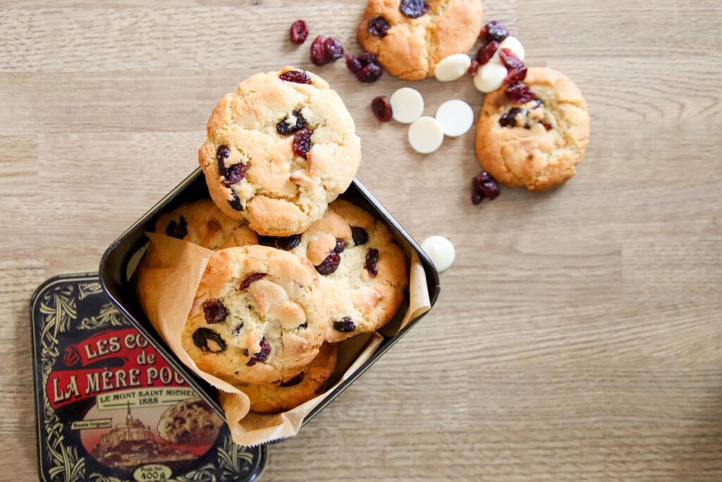 White chocolate cranberry cookies with dried cranberries and zest.