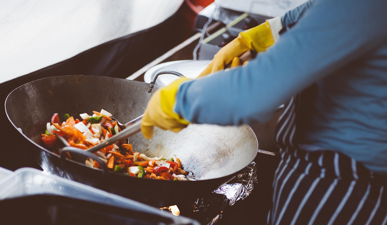 Stir-fry in a wok with an array of colorful vegetables