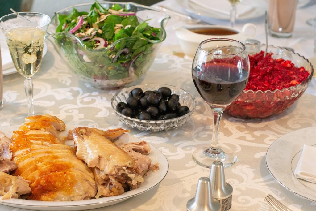 A vibrant dinner table filled with colorful vegetable-based dishes, from salads to stir-fries, 